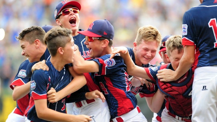 The winning team celebrates at the Little League World Series.